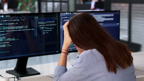 Female Programmer Sits At Desk, Feeling Bored 스톡 동영상 333400071