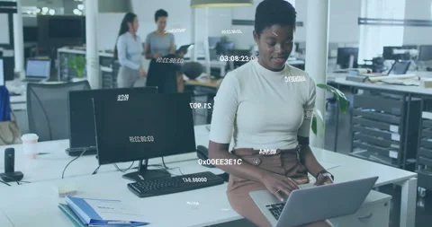 Female programmer sitting on white bench typing code after overlay appearing for Stock Footage 313553237