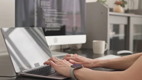 Female Programmer Typing Program Code on Laptop Video stock 171533215