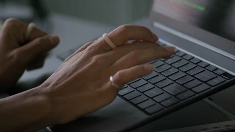 Female Programmer Typing Program Code and Working on Laptop in Office Stock Footage 292620846