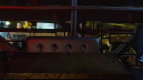 Female Programmer Using Computer in Bar Stock Footage 105287857