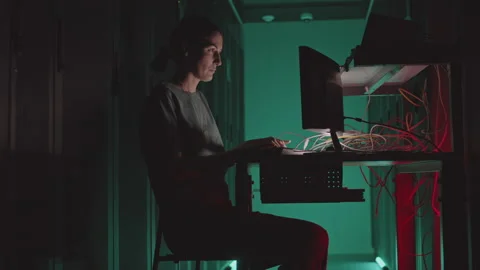 Female Programmer Using Computer in Dark Stock-Footage 162468290