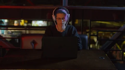 Female Programmer Using PC in Bar Stock Footage 105291272