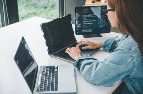 Female programmer working on coding, software development and web design.Co.. 스톡 사진