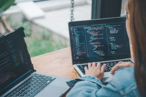 Female programmer working on coding, software development and web design.Co.. 스톡 사진