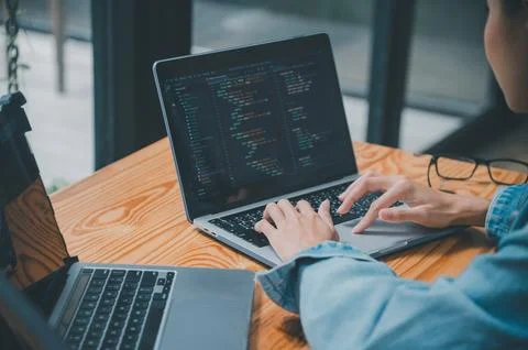 Female programmer working on coding, software development and web design.Co.. Stock Photos