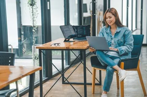 Female programmer working on coding, software development and web design.Co.. 스톡 사진