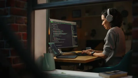 Female Programmer Working On Computer Stock Footage 197421561