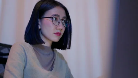 Female Programmer Working Late Night on Coding Project. Stock Footage 300246971