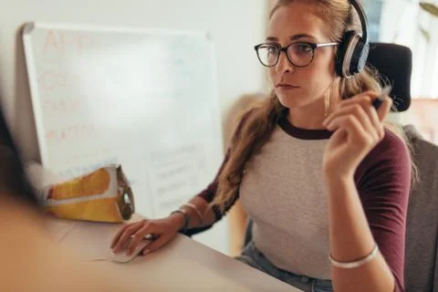 Female programmer working on new software development Stock Photos
