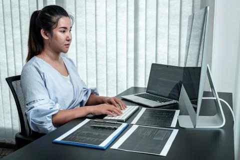 Female Programmer working in software javascript computer in IT office, Writi Stock Photos