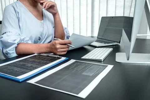 Female Programmer working in software javascript computer in IT office, Writi Stock Photos