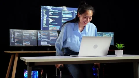 Female Programmer Working Space To Write Code Laptop Using Multiple Monitors Stock Footage 244423910
