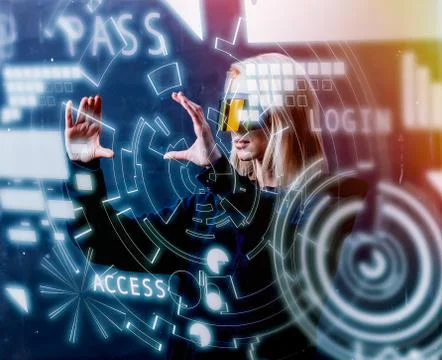 Female programmer works with personal data in virtual glasses Stock Photos