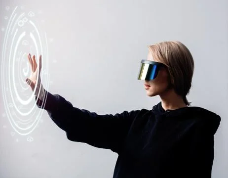 Female programmer works with personal data in virtual glasses Stock-Fotos