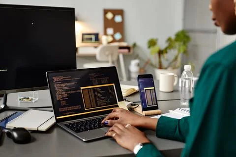 Female Programmer Writing Code Closeup Foto stock