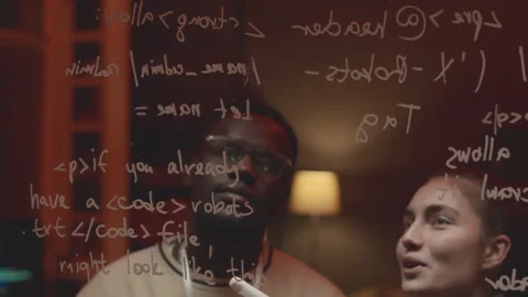 Female Programmer Writing Computer Command on Glass Board Stock Footage 259153694