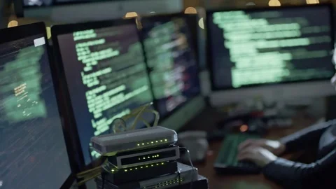 Female Programmer Writing Program Code at Night Stock Footage 76311005