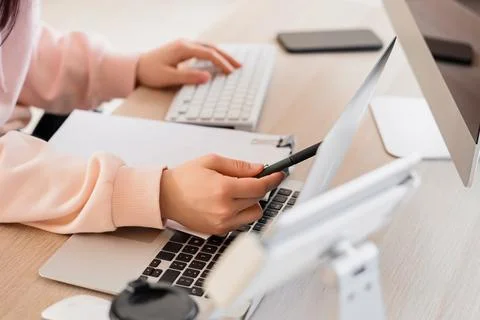 Female programmers hands testing code on laptop in office, closeup Stock-Fotos