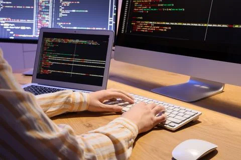 Female programmers hands working with computer in office at night 스톡 사진