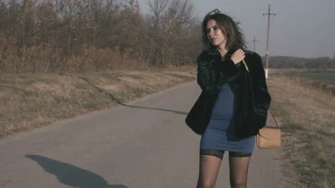 Female Prostitute Standing On The Road Stock Footage 120086852