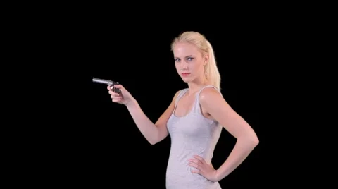 Female pulling trigger of pistol and bang flag opening 動画素材 6733604