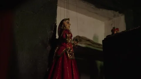 Female Puppet Hanging Backstage in Dim Light Stock Footage 310730756