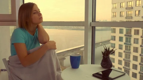 Female relaxing in flat Stock Footage 86254799