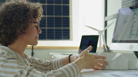 Female Renewable Energy Developer Working on Project Stock-Footage 230105773