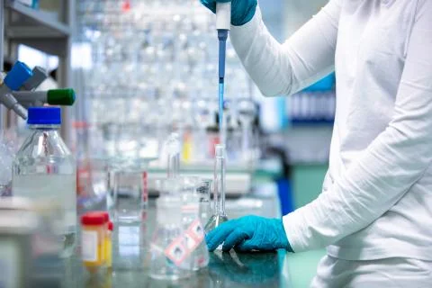Female researcher, developer doing research, experiments in chemistry laboratory Stock Photos
