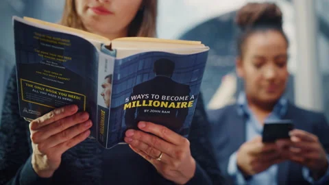 Female Riding Elevator Reading Book 스톡 동영상 167837577