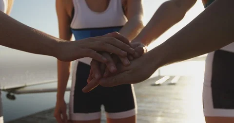 Female rowing team training on a river Stock Footage 116011076