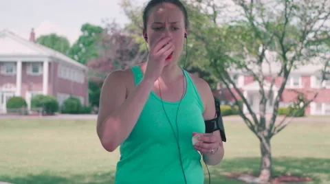 Female Runner with Ashtma Using Inhaler Stock Footage 63522399