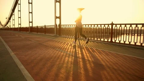 Female runner is having street workout Stock Footage 95835901