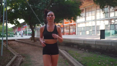 Female runner jogging in park Stock-Footage 256014827
