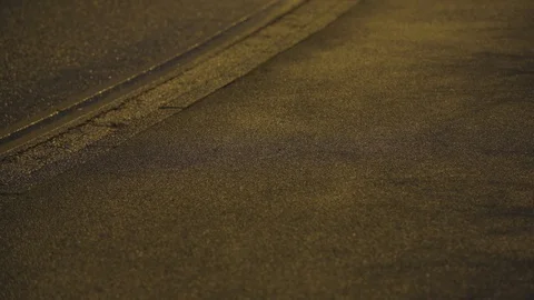 Female runner jogging on street at night Stock Footage