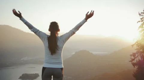 Female runner on top of the world cheering in winning gesture Stock-Footage 56918322