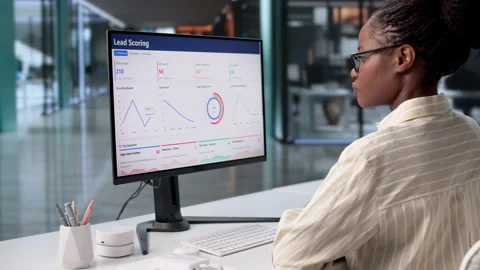 Female Sales Manager Using Lead Scoring And CRM Software Stock Footage 328402172