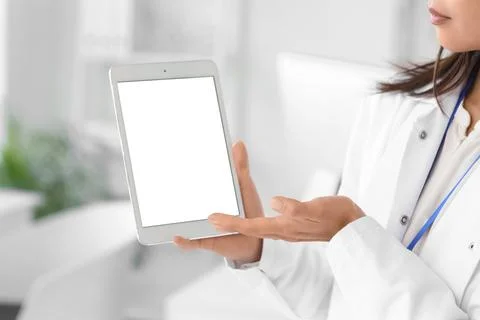 Female scientist with blank tablet computer in laboratory, closeup Stock Photos