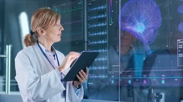 Female Scientist Uses Tablet Computer In the Modern Brain Study Laboratory Stock Footage 85876737