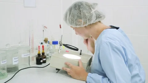 Female scientist working in lab Stock Footage 78502500