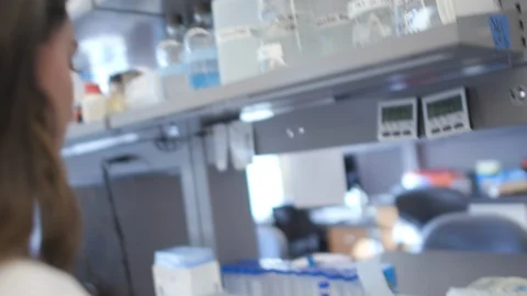 Female Scientist Working In Lab Stock Footage 122935653