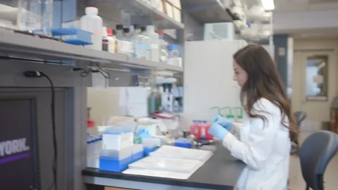 Female Scientist Working In Lab Stock Footage 122936110