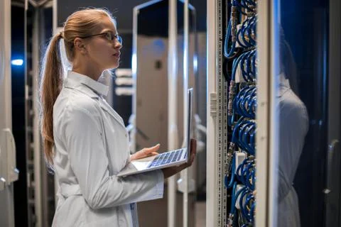 Female Scientist Working with Supercomputer 写真素材