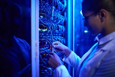 Female Scientist Working with Supercomputer 스톡 사진