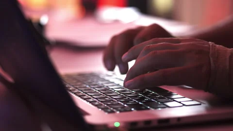 Female screenwriter assistant edits script on computer Video stock 255486386