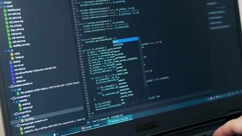 The Female Senior Developer Debug Program, Writes Program Code. A Professional   Stock Footage 145581194