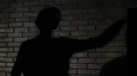 Female Shadow on a Brick Wall Video stock 36782199
