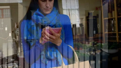 Female shopper tapping pink device while updating list, finance chart shifting Stock Footage 332772034