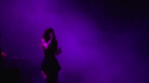 Female singer in a live concert Stock Footage